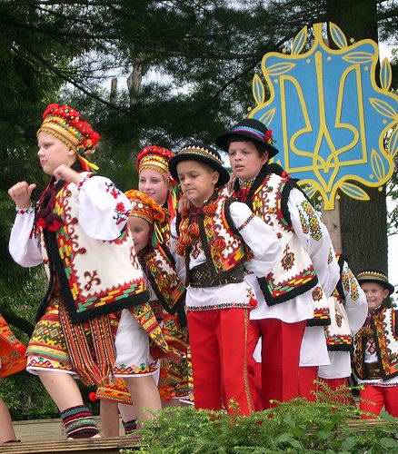 Ukrainian children wearing national costumes photo